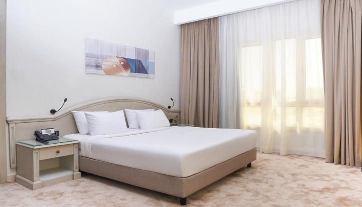 Triumph Plaza Hotel Room