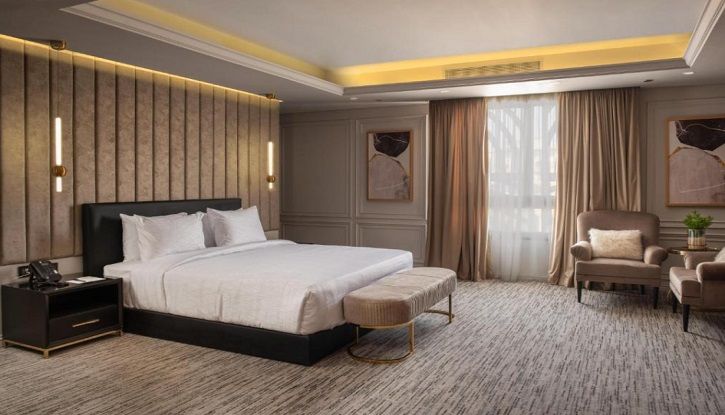 Triumph Luxury Hotel Room